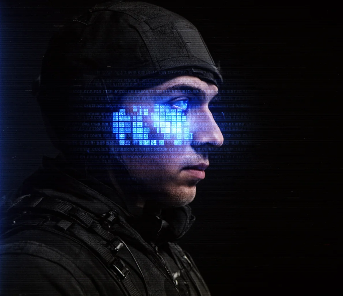Guy Looking into the distance, in a dark background with Facebook UTM parameters glow across his face.